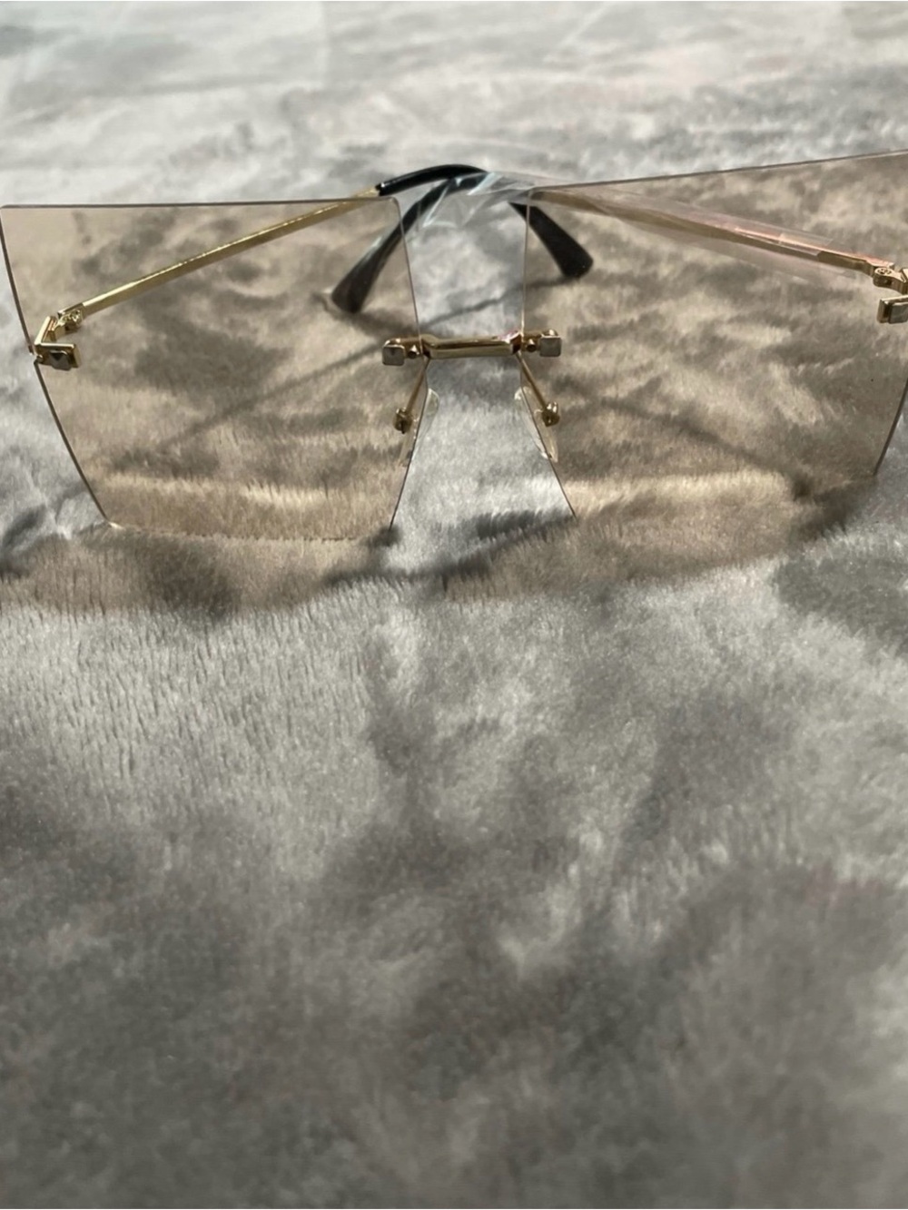 Gold Rimless Shield Sunglasses with Light Brown Lenses